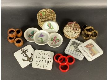 An Assortment Of Coasters & Napkin Rings