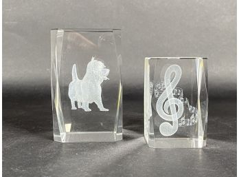 A Pair Of 3D Laser-Etched Crystal Paperweights