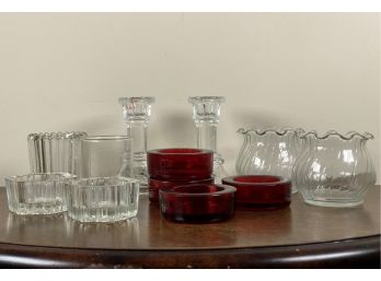 An Assortment Of Glass Candle Holders