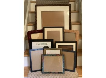 A Large Assortment Of Picture Frames