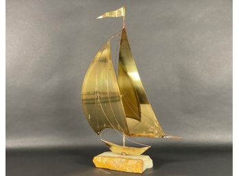 A Vintage Sailboat Model In Brass