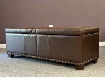 A Button-Tufted Storage Bench With A Hinged Lid