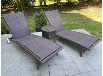 2 Coated Wicker Lounge Chairs And Side Table