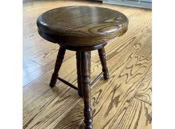 An Antique Oak Spindle Piano Stool