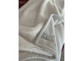 A Cozy White Potterybarn Fuzzy Throw Blanket
