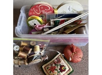 A Box Of Assorted Sewing Notions And More