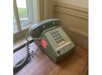 A Retro Green Push Button Telephone