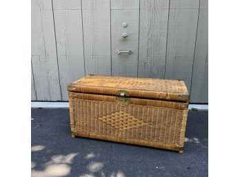 A Wicker Woven Trunk With Asian Influence