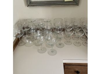 An Acrylic Wine Rack And Assorted Wine Glasses Including 12 New In Box