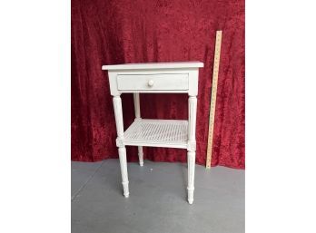 Yves Delorme White Side Table With One Drawer And A Caned Shelf, Lot 1