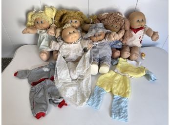 Six Cabbage Patch Dolls With Outfits, 3 Cabbage Patch Kids And 3 Cabbage Patch Babies, Great Clean Condition.