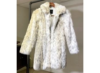A Ladies Faux Fur Coat