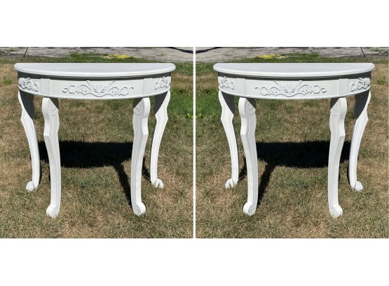 A Pair Of Painted Wood Demi Lune Console Tables