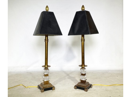 A Pair Of Stick Lamps With Leather Shades
