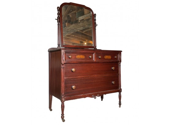 An Antique Mahogany Mirrored Dresser