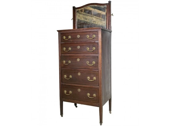 An Antique Mahogany Tall Dresser With Mirror