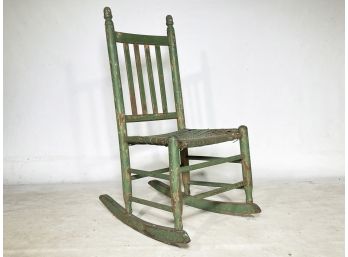 An Antique Painted Wood Rush Seated Rocker