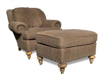 An Upholstered Arm Chair And Ottoman By Cotswold Cottage For Highland House Furniture