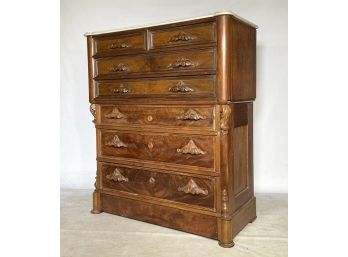 A Carved Wood Marble Top Victorian Dresser