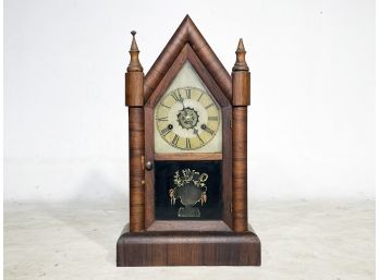 An Antique Clock By The William Gilbert Clock Company