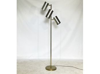A Modern Brass And Chrome Standing Lamp