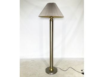 A Tall Modern Standing Lamp In Brushed Steel And Brass