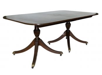 A Banded Mahogany Pedestal Base Dining Table