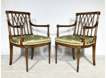 A Pair Of Neoclassical Arm Chairs With Silk Upholstery