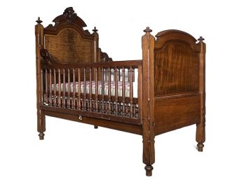An Antique Victorian Carved Oak Crib
