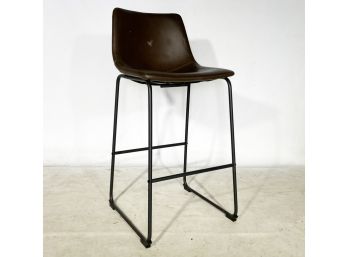 A Modern Brown Leather Stool