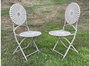 A Pair Of Vintage Wrought Iron Sunburst Style Folding Chairs
