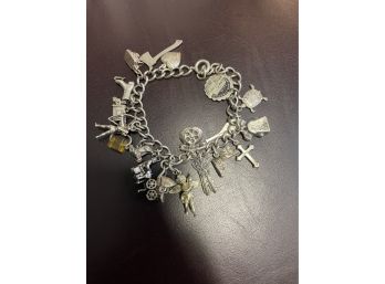 Vintage Sterling Silver Charm Bracelet . Approx 18 Charms