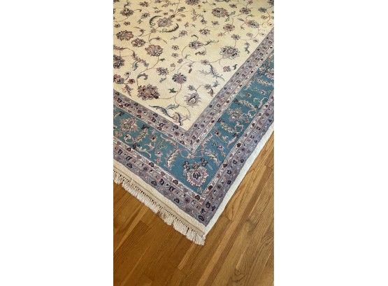 A Vintage Hand Knotted 100 Wool Area Rug.