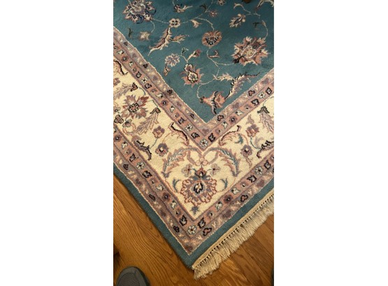 A Vintage Area Rug Hand Knotted With Fringe