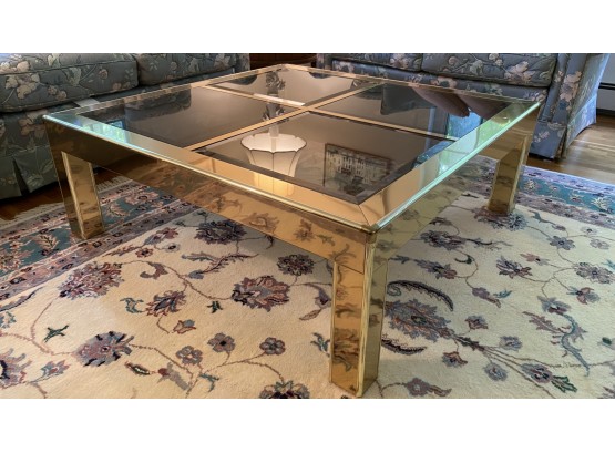 An MCM Glass And Brass Coffee Table