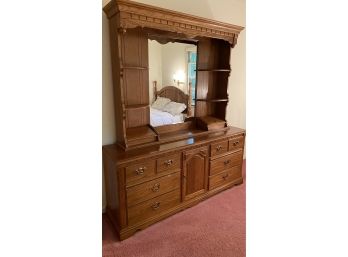A Thomasville Oak Wood Dresser With Mirror