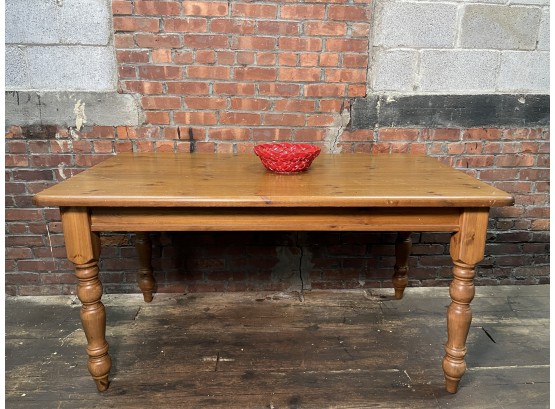 A Pottery Barn Pine Kitchen Table