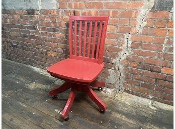 A Red Pottery Barn Kids Taylor Swivel Chair On Wheels