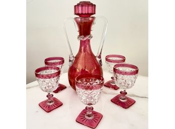 Vintage Cranberry Double Handled Blown Glass Bottle With Cork Stopper And  Five Cut Crystal Sherry Glasses.