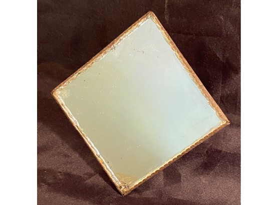 An Old Shaving Travel Mirror