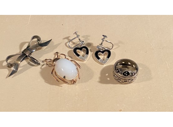 A Group Od Marked Sterling Silver Items.