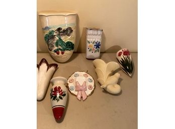 A Group Of Vintage Ceramic Wall Pocket Planter