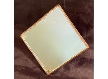 An Old Shaving Travel Mirror