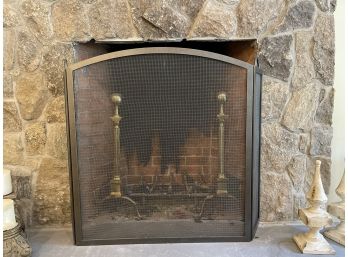A Black Metal Fireplace Screen