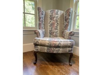 A Home Furnishings Floral Wingback Chair