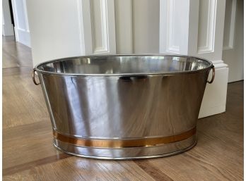 A Large Wine Bucket With Copper Toned Handles