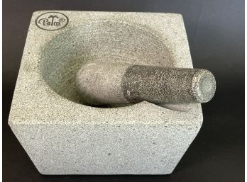 A Palm Mortar And Pestle