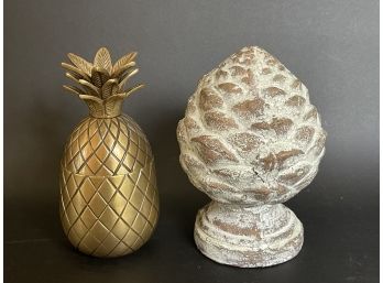 A Pineapple Candle With A Decorative Finial