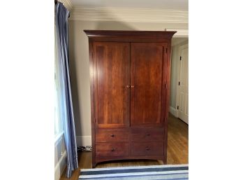 A Kincaid Gathering House Collection Cherry Finish Solid  Wood Wardrobe