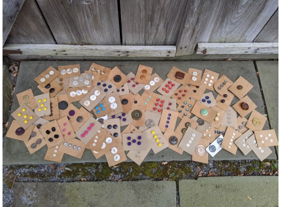 Collection Of Vintage And Antique Buttons Sewn Onto Boards